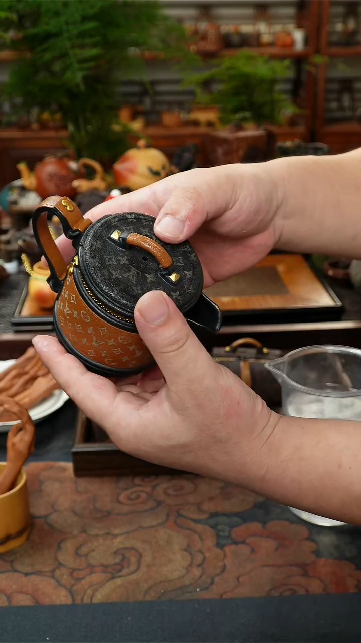 茶壶紫砂水桶包环境改变v客户给包括