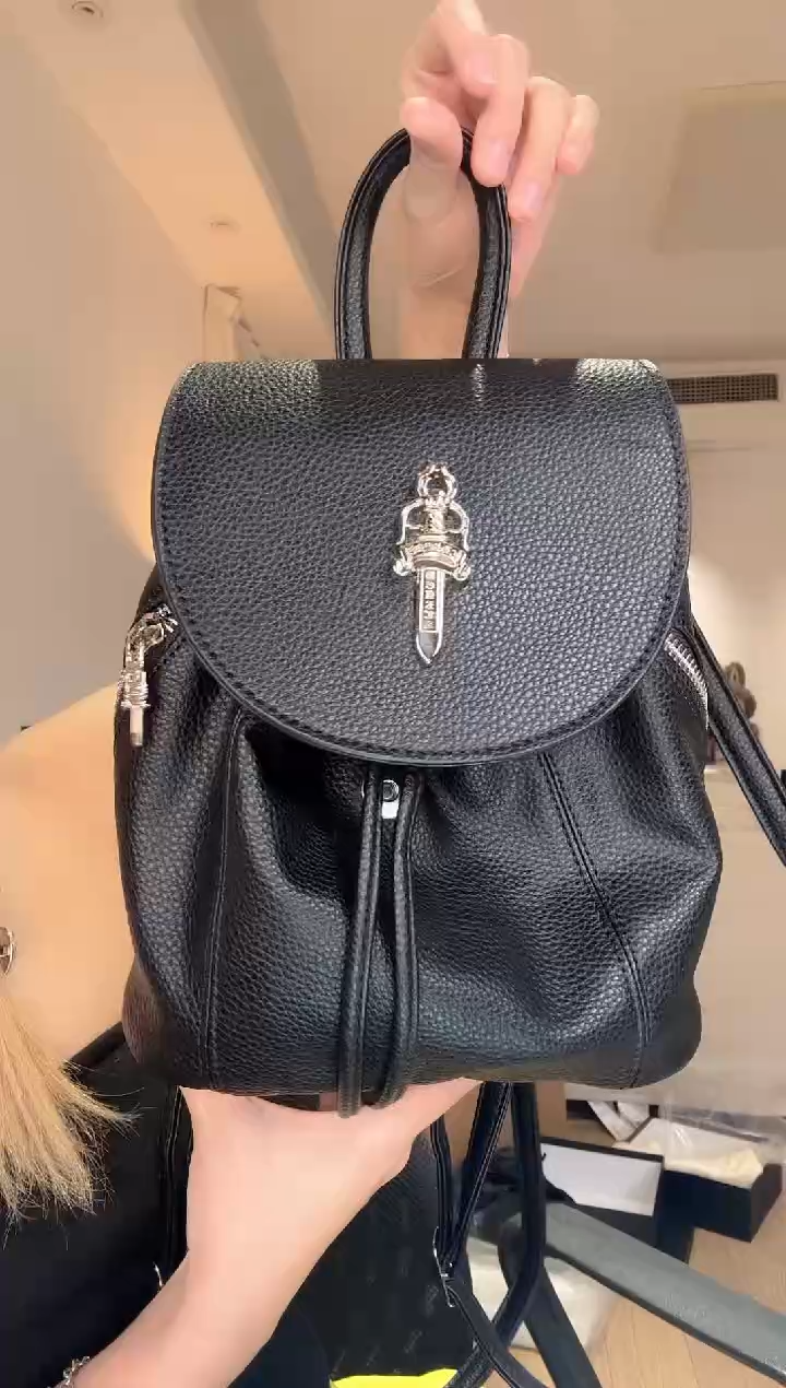 牦牛剖层皮革圣剑背带头层嘻哈街头黑色双肩包