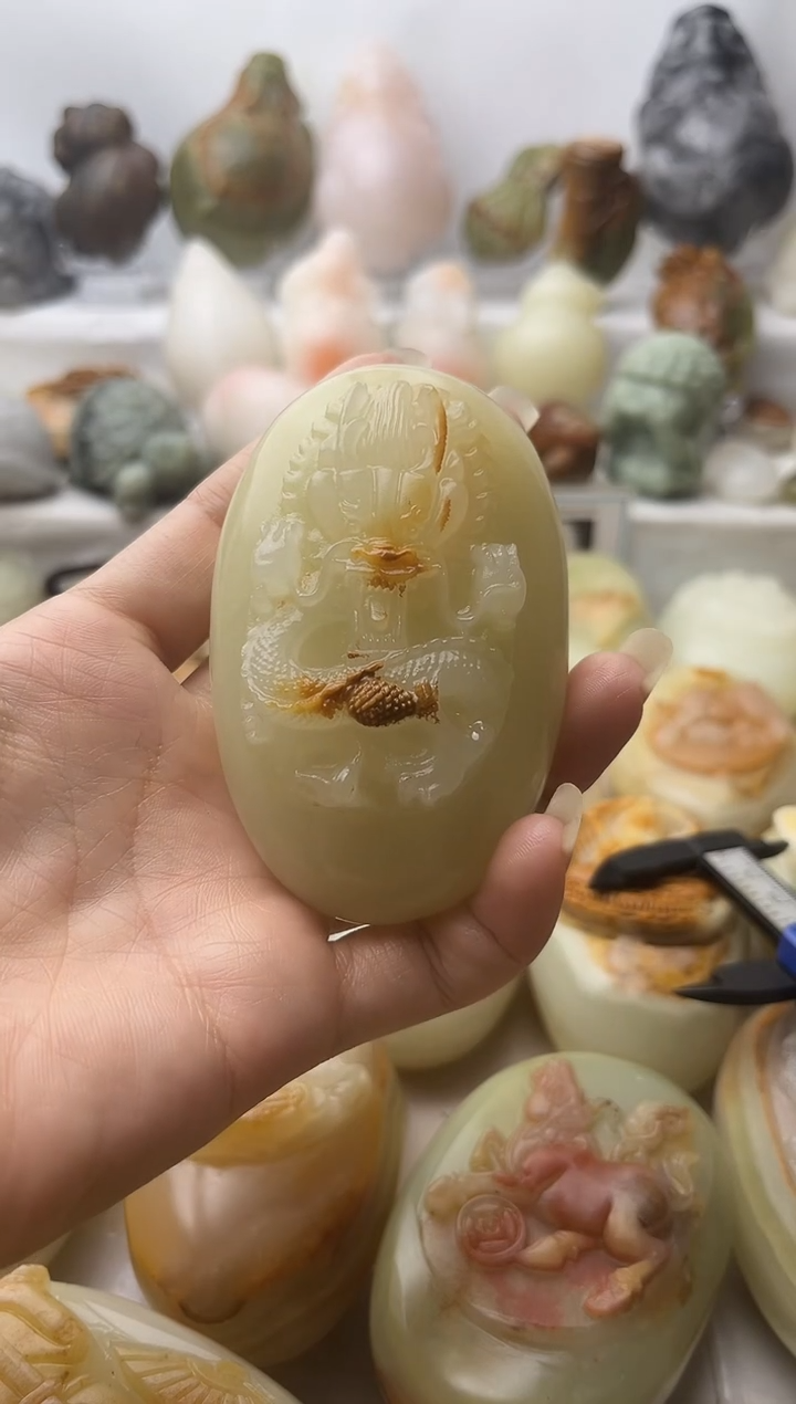 石材方解石手把件不退换龙