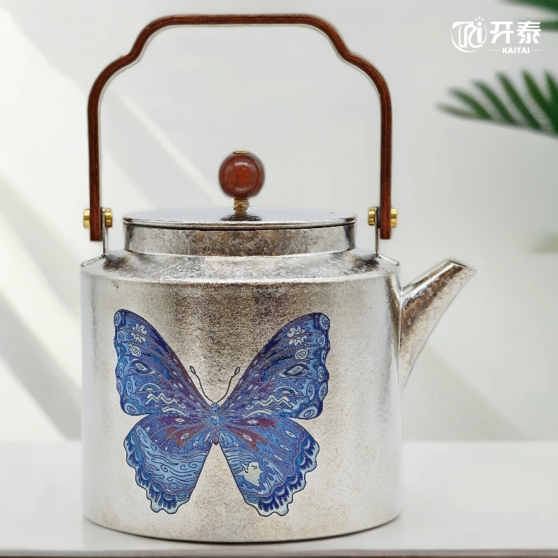 开泰【设计师款】开泰纯钛双面光明女神蝶茶具木把手凤鸣提梁壶