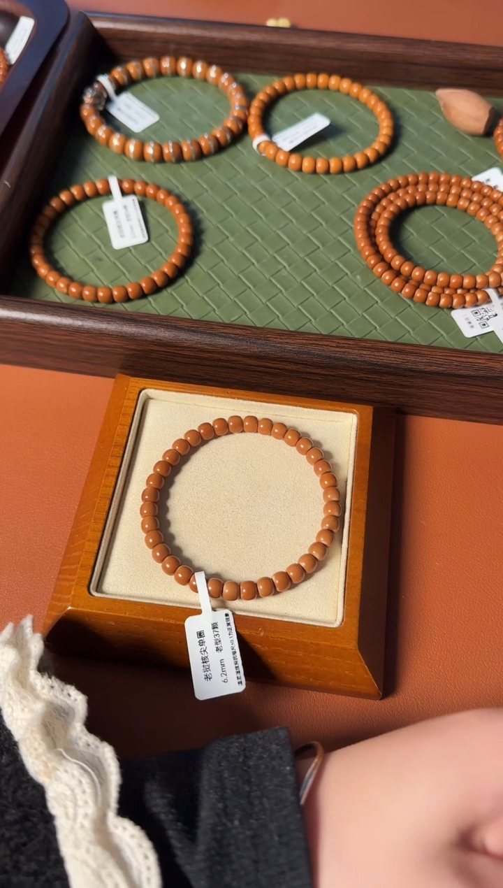 手串橄榄核6.2mm老挝核尖老型单圈、正三花