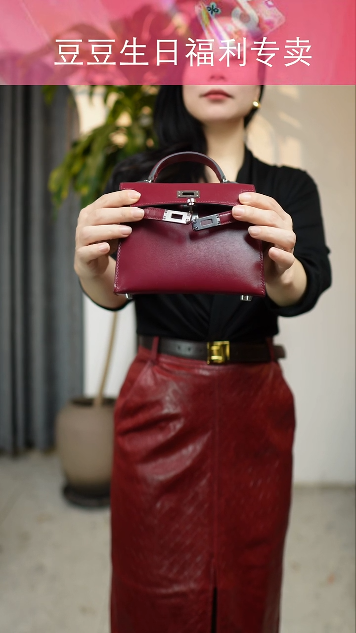 玲**。大官人真皮长肩带包包，安哥拉红色