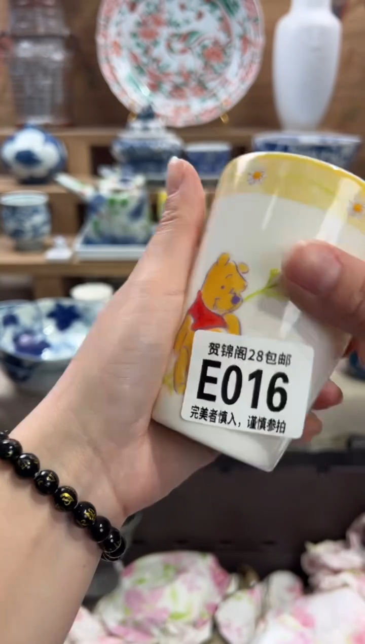 瓷片木**杕      E016