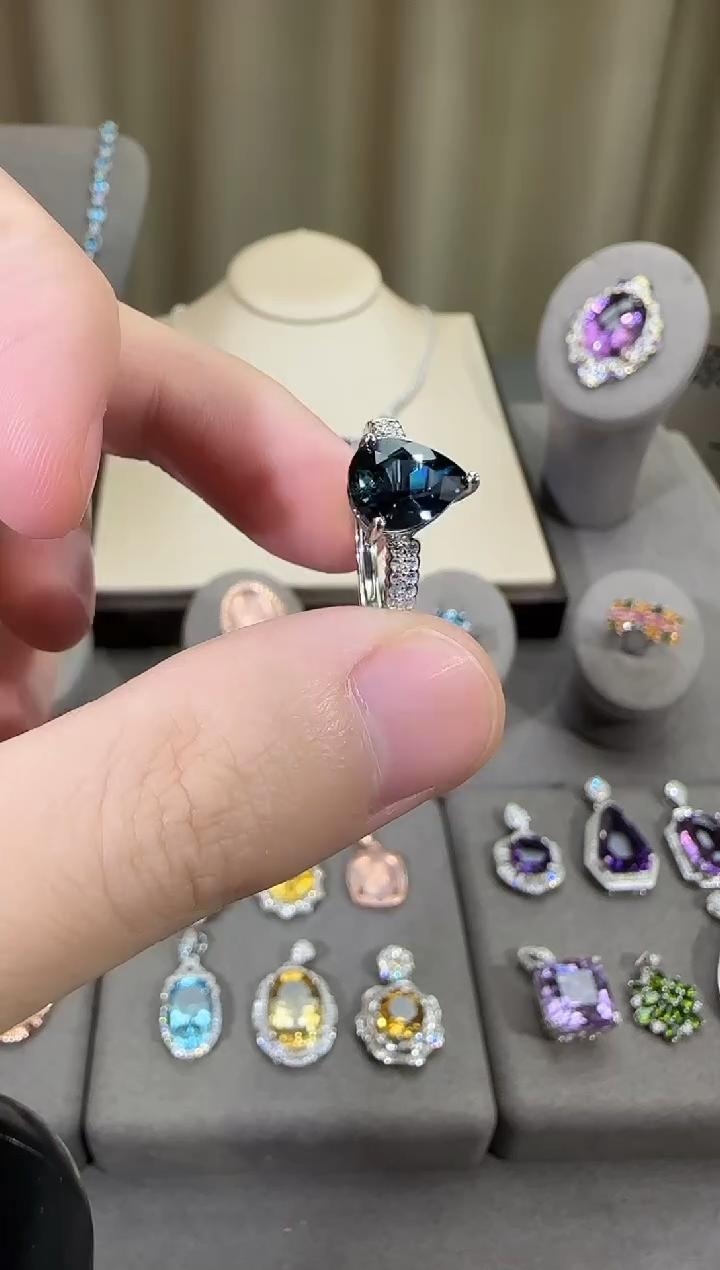 银S925镶嵌戒指托帕石10*8mm水滴款伦敦蓝