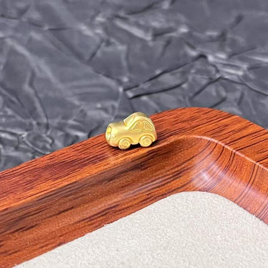 君潮黄金足金999黄金通孔小车车编绳款DP0054