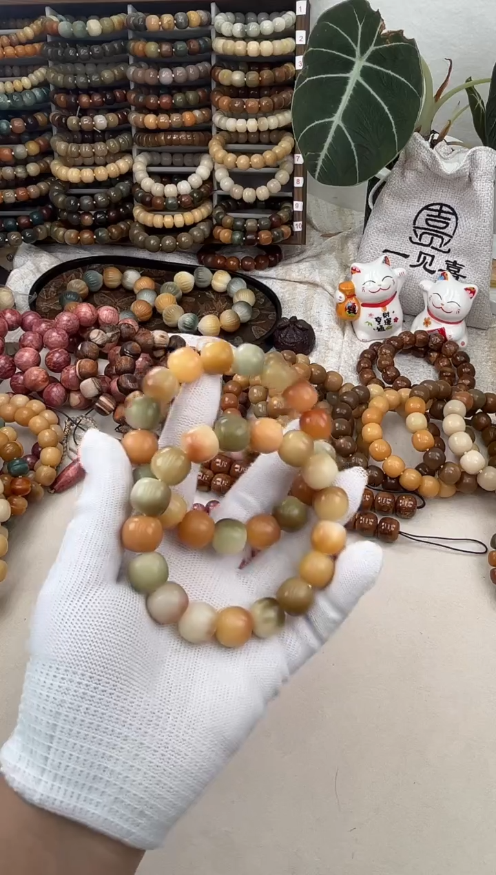 菩提根/象牙果手串a684卡15 干磨