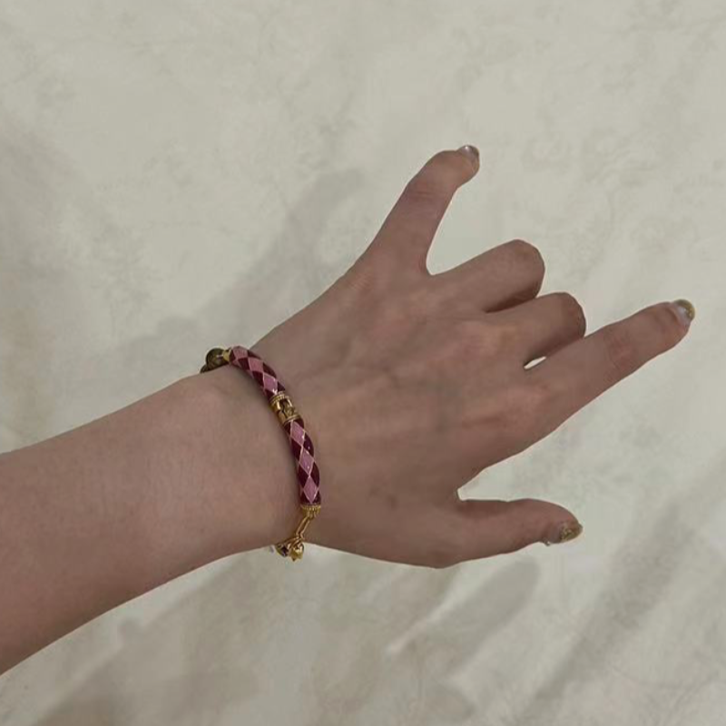 沉香月球来信110海南莺歌绿棋楠0.7圆珠粉色菱格设计款手串·定制