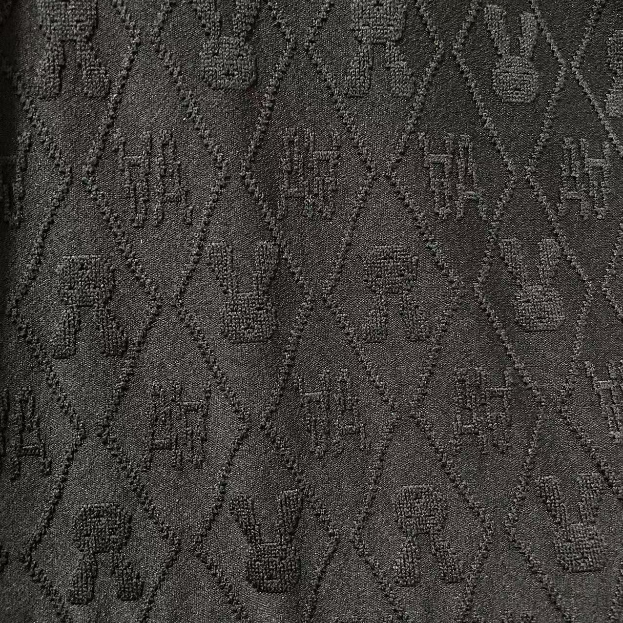 A黑底兔子字母提花针织弹力面料（不支持7天无理由）