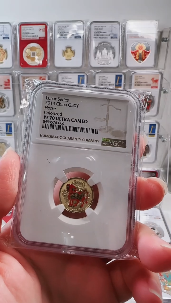 纯金2014年二轮彩金马1/10盎司金币NGC70分