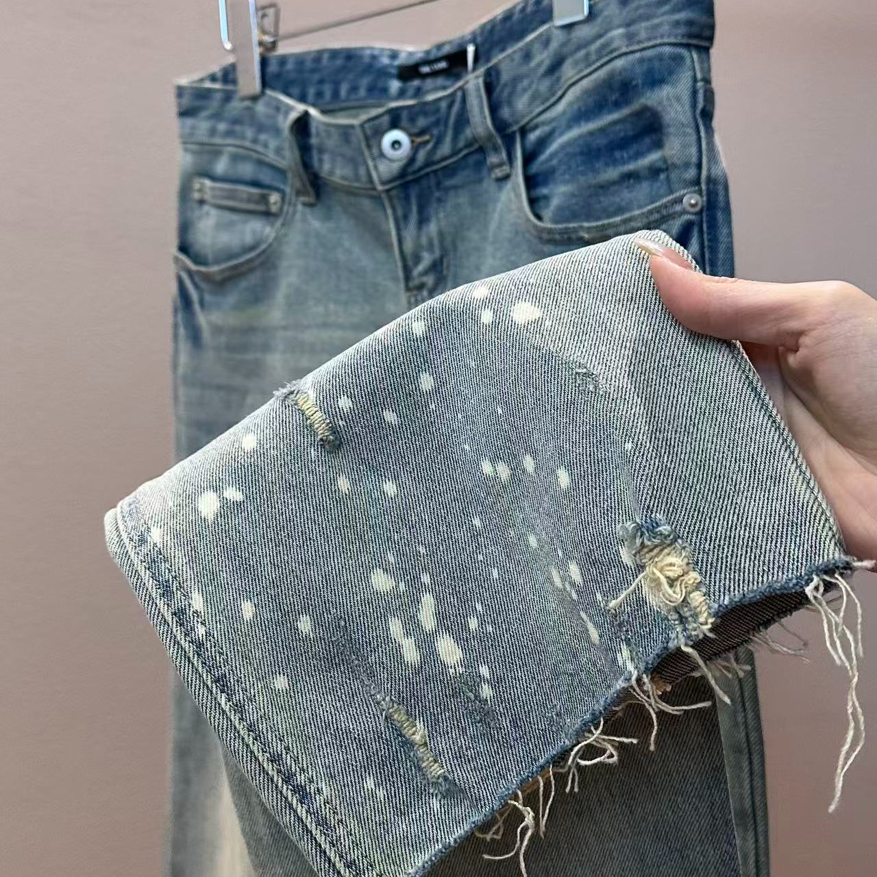 潮流泼墨做旧洗水破洞微喇牛仔长裤9881