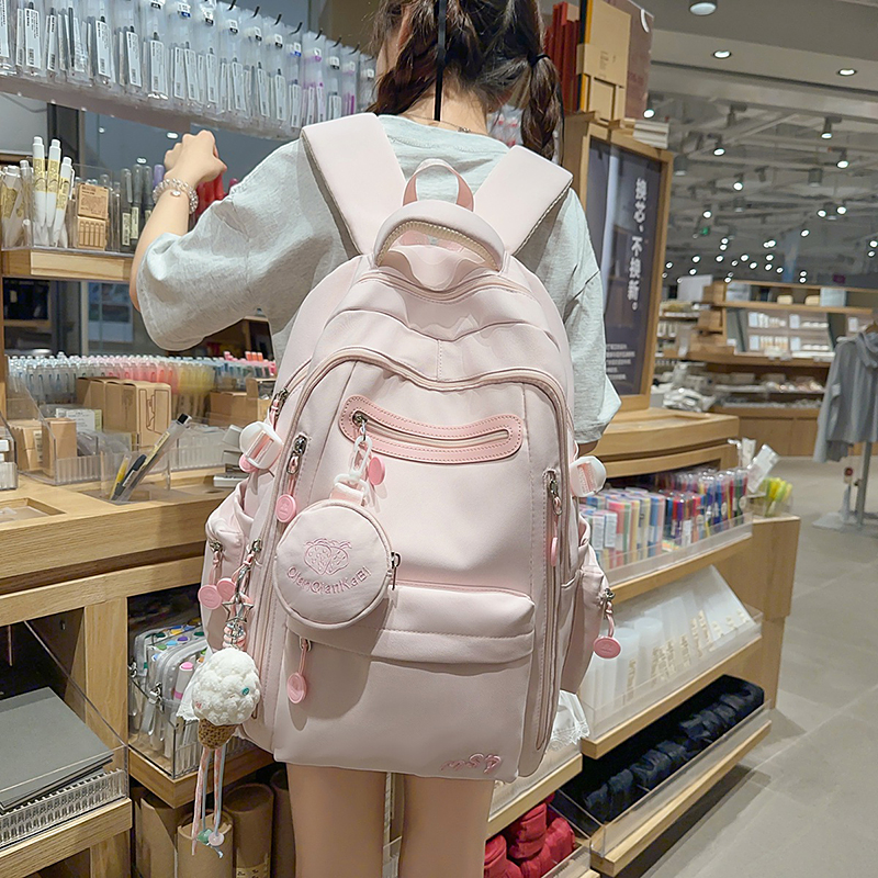 书包大学生女粉色可放电脑小众韩版百搭校园双肩包旅游轻便大容量