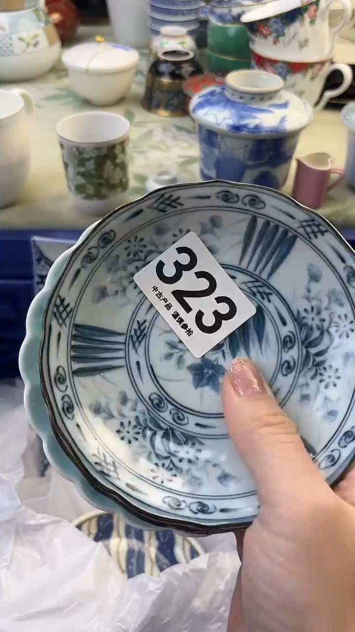 瓷片谢****国323........