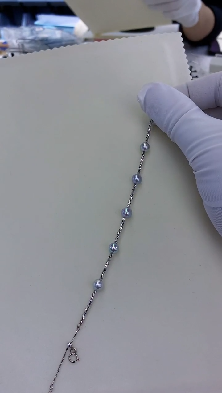 18K金镶嵌饰品海水珍珠真多麻色设计款手链