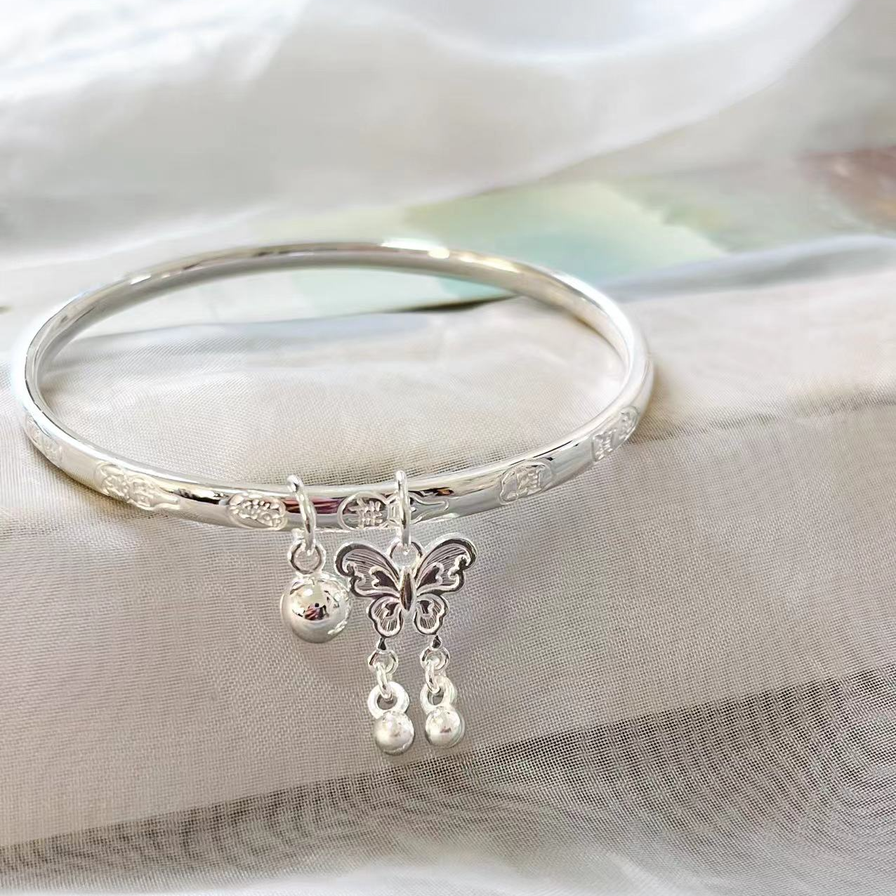 足银手镯 致爱一生足银999.9【素，蝴蝶流苏】手镯56#