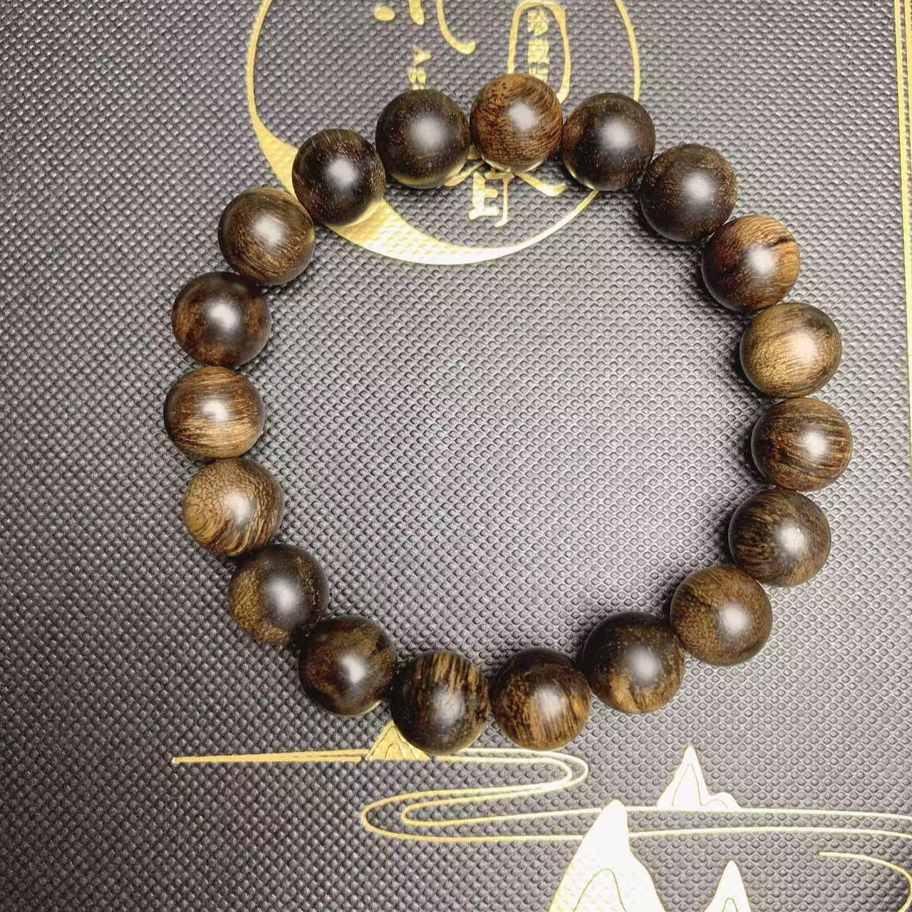 1.0圆珠 越南芽庄白棋玉化黑油留疤