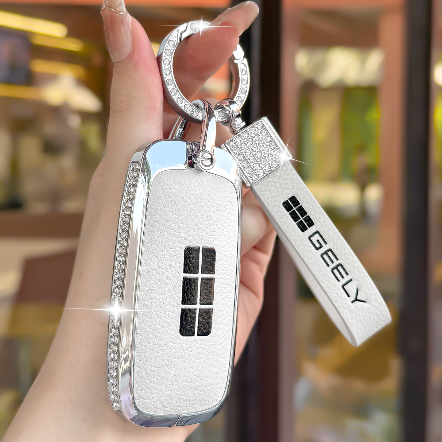 吉利银河E5钥匙套A7/L7/L6/M9/E8星耀8星舰7车壳扣真皮包女