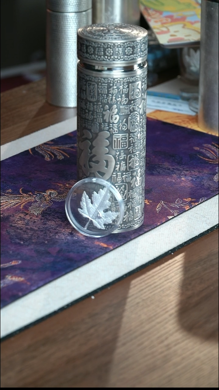 足银浮雕百福杯————————