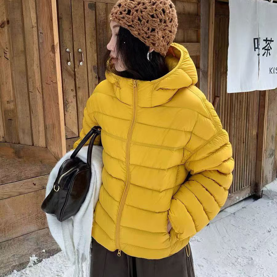 90白鸭绒2025冬季新款韩版连帽排骨羽绒服女短款宽松洋气百搭外套