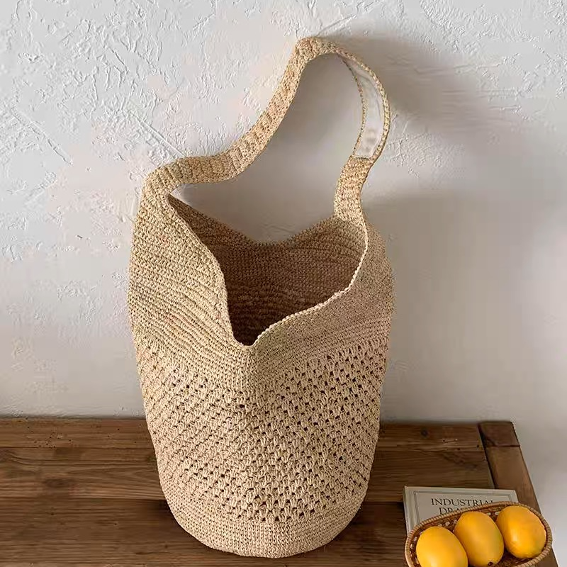百搭法式镂空草编包编织水桶包大容量沙滩海边度假风单肩托特包女