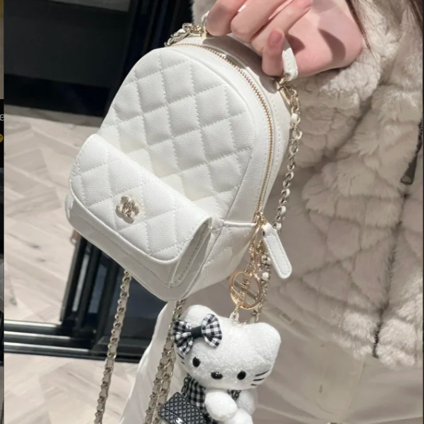 99新 Chanel/香奈儿 小花6花 24C 手提前口袋双肩包 白色 镭射标 