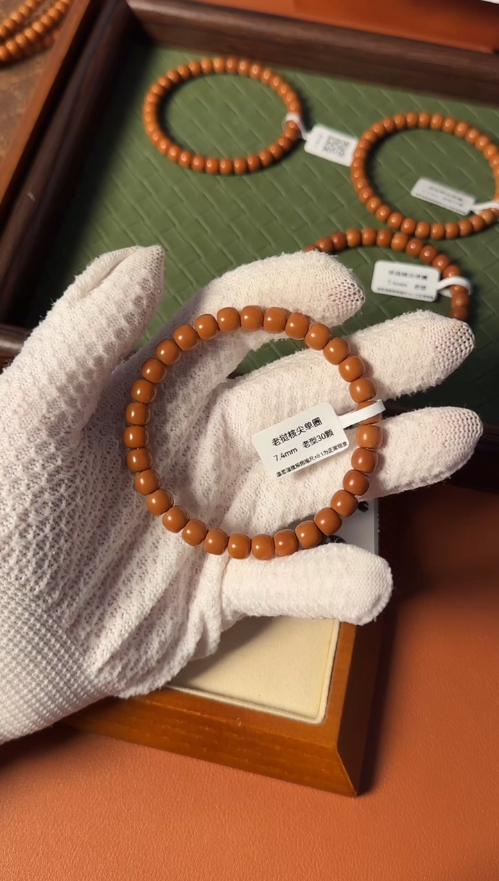 手串橄榄核【168核尖】7.4mm老挝核尖老型单圈三花面无白树王老料