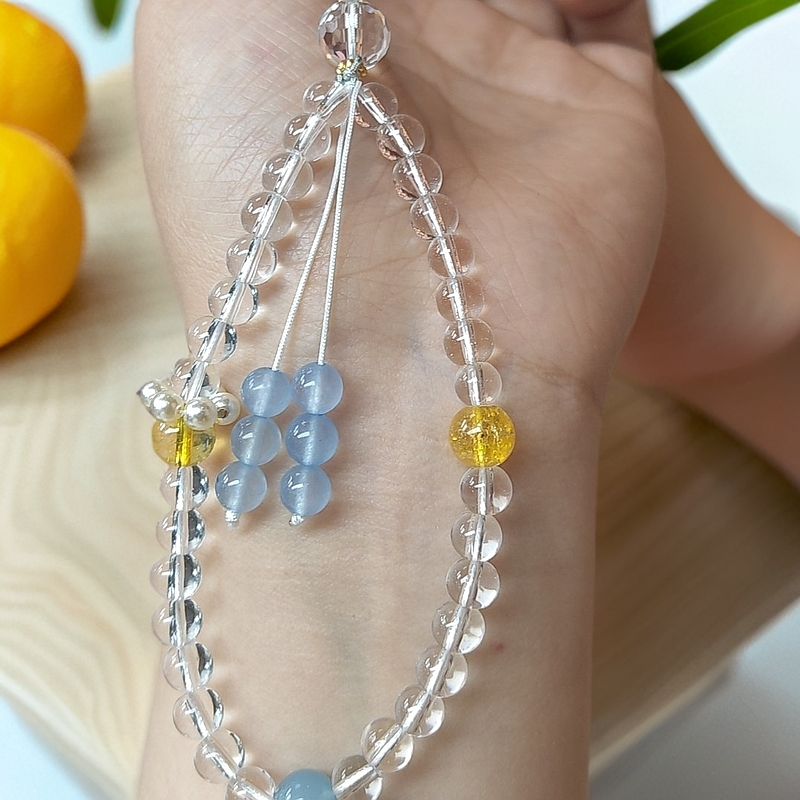 设计款白水晶手机挂