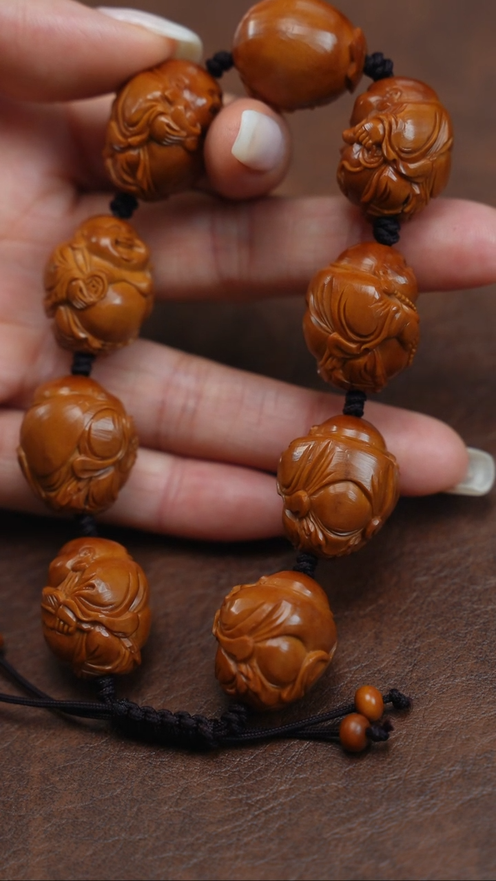 手串橄榄核。**录橄榄核