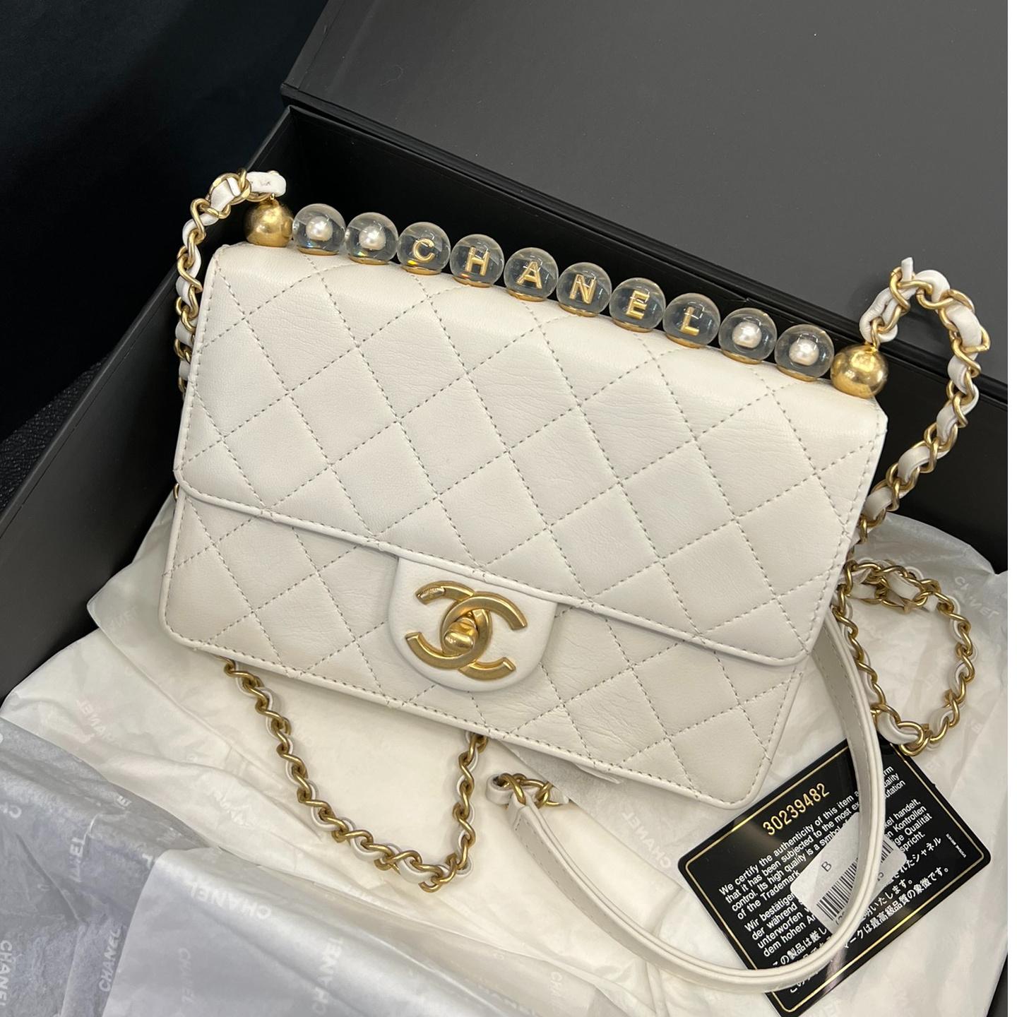 95新 Chanel/香奈儿 亚克力珠金扣山羊皮白色斜挎包30开 /159387