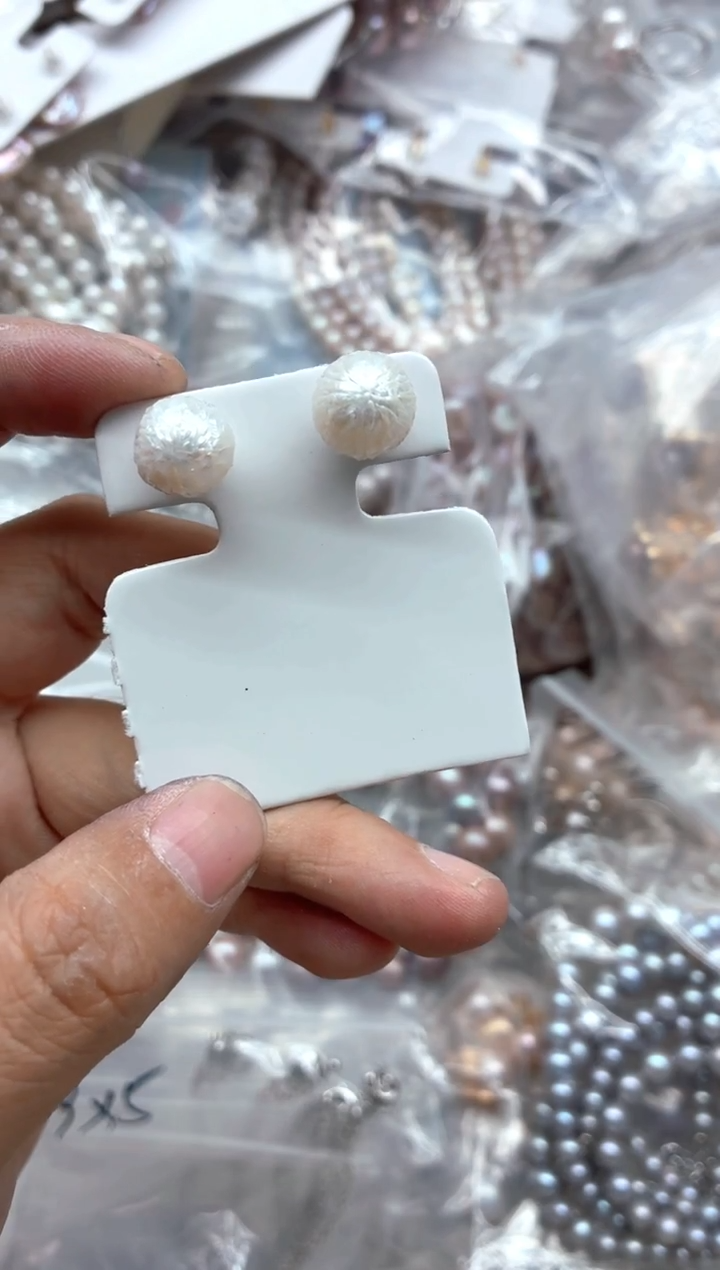 银S925镶嵌耳钉淡水珍珠朵****y，非无暇