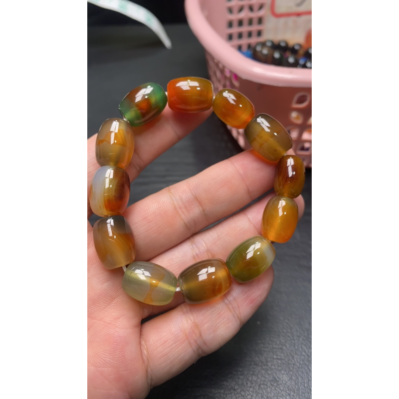 D 548 孔雀桶珠手串