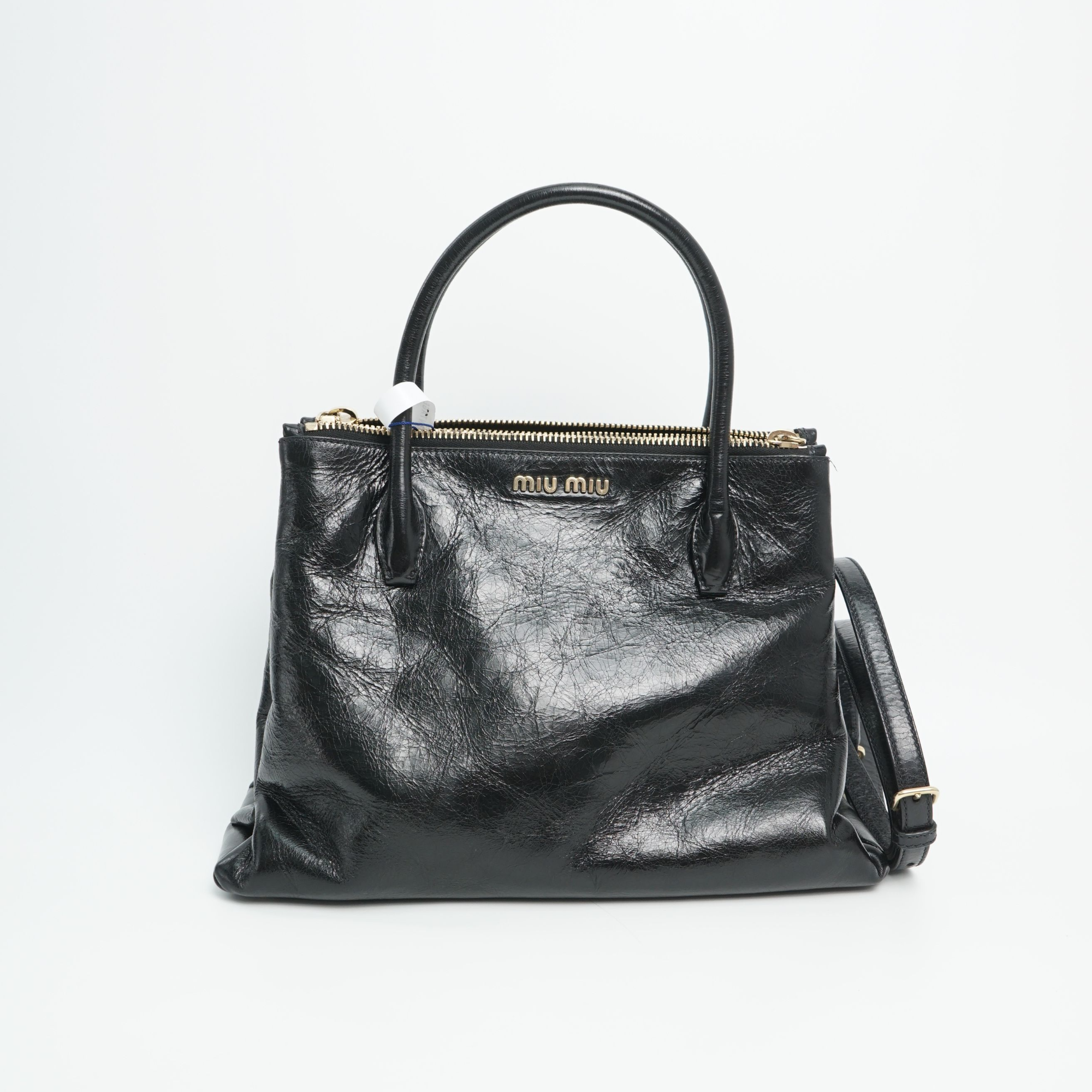 95新 MIU MIU/缪缪 缪缪托特单肩包黑金油蜡皮/DS013442