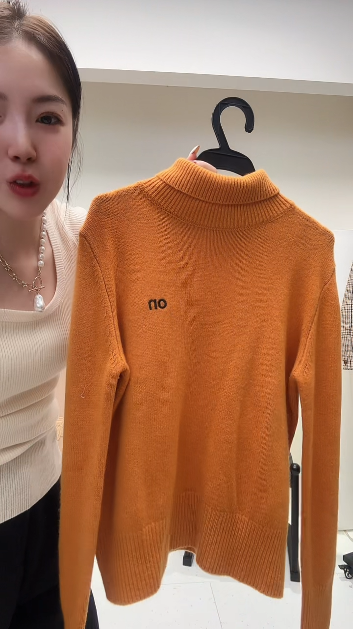 橘色刺绣中领上衣