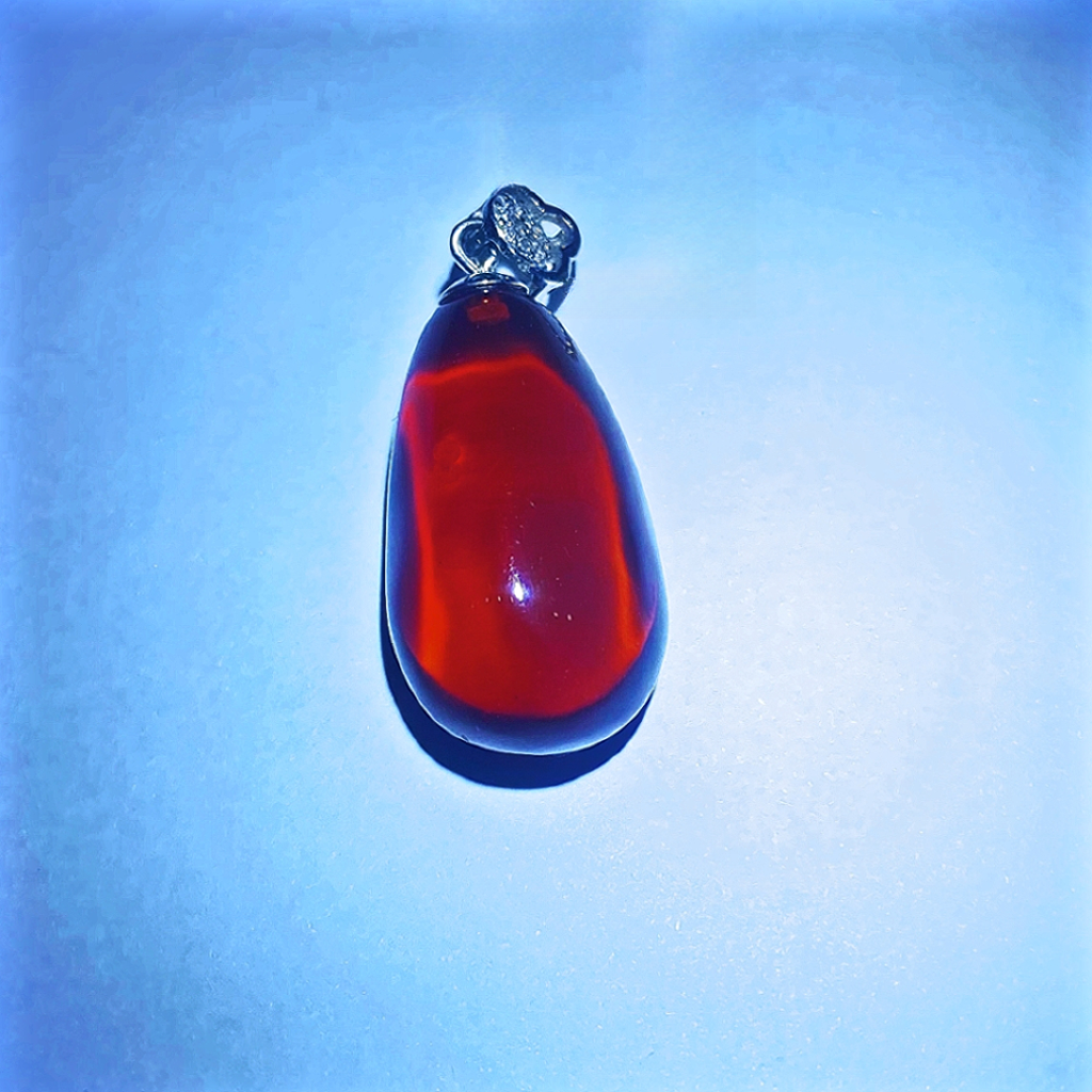 缅甸原矿干放血珀水滴S925银镶嵌 净重约2.9克