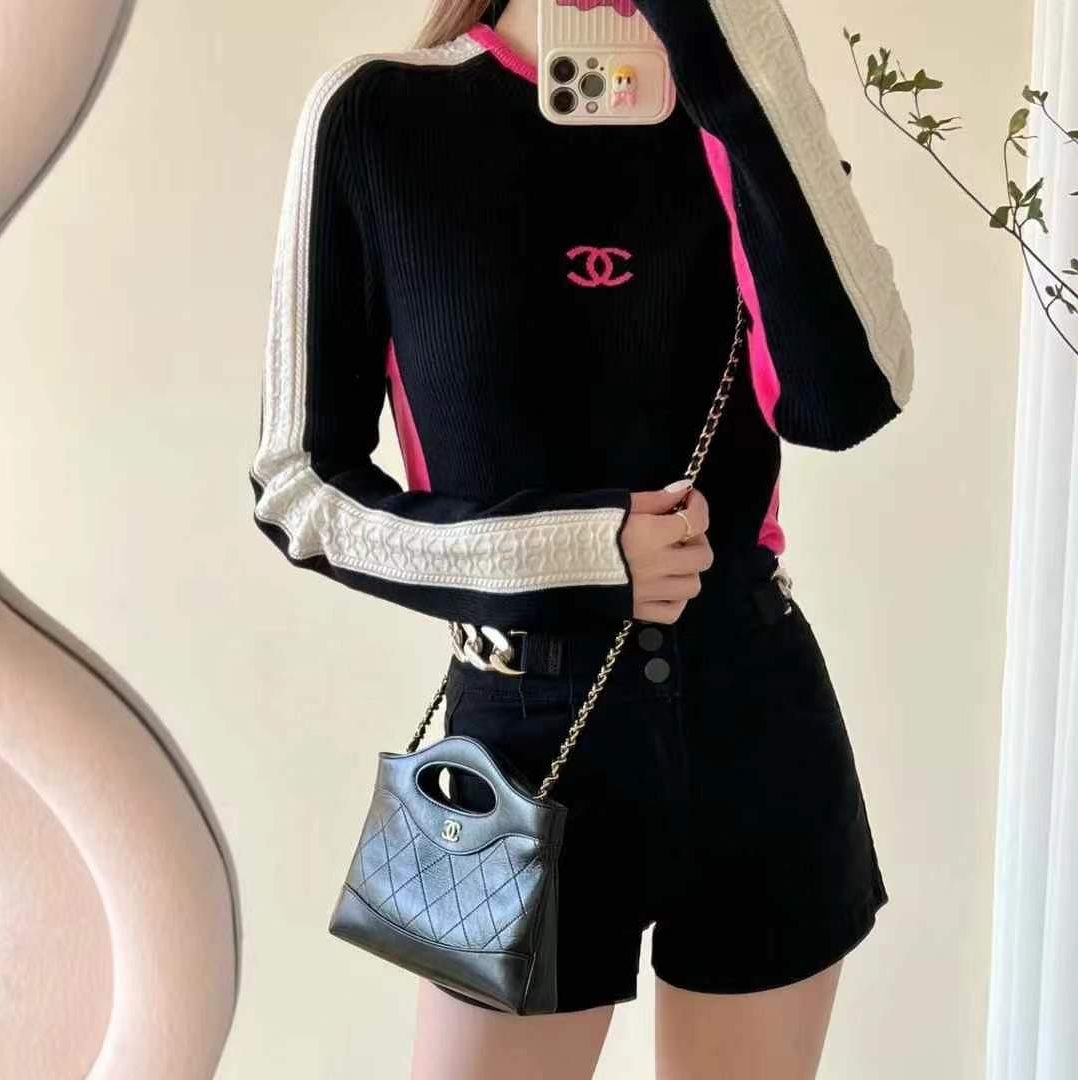 99新 Chanel/香奈儿 34码滑雪系列黑粉拼色双C半高领长袖毛衣