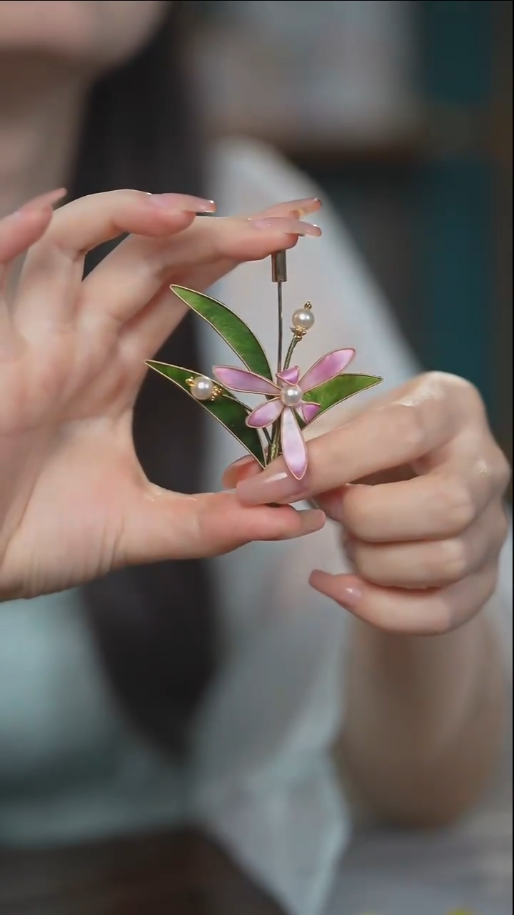 织绣快**兰兰花朵朵开