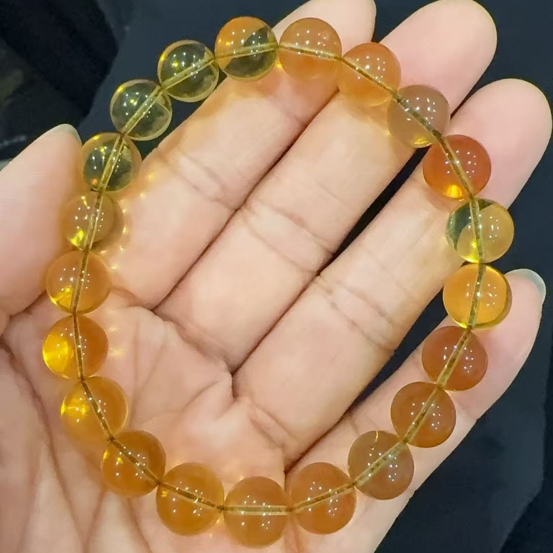 约7mm缅甸净水金兰蓝珀圆珠单圈手串