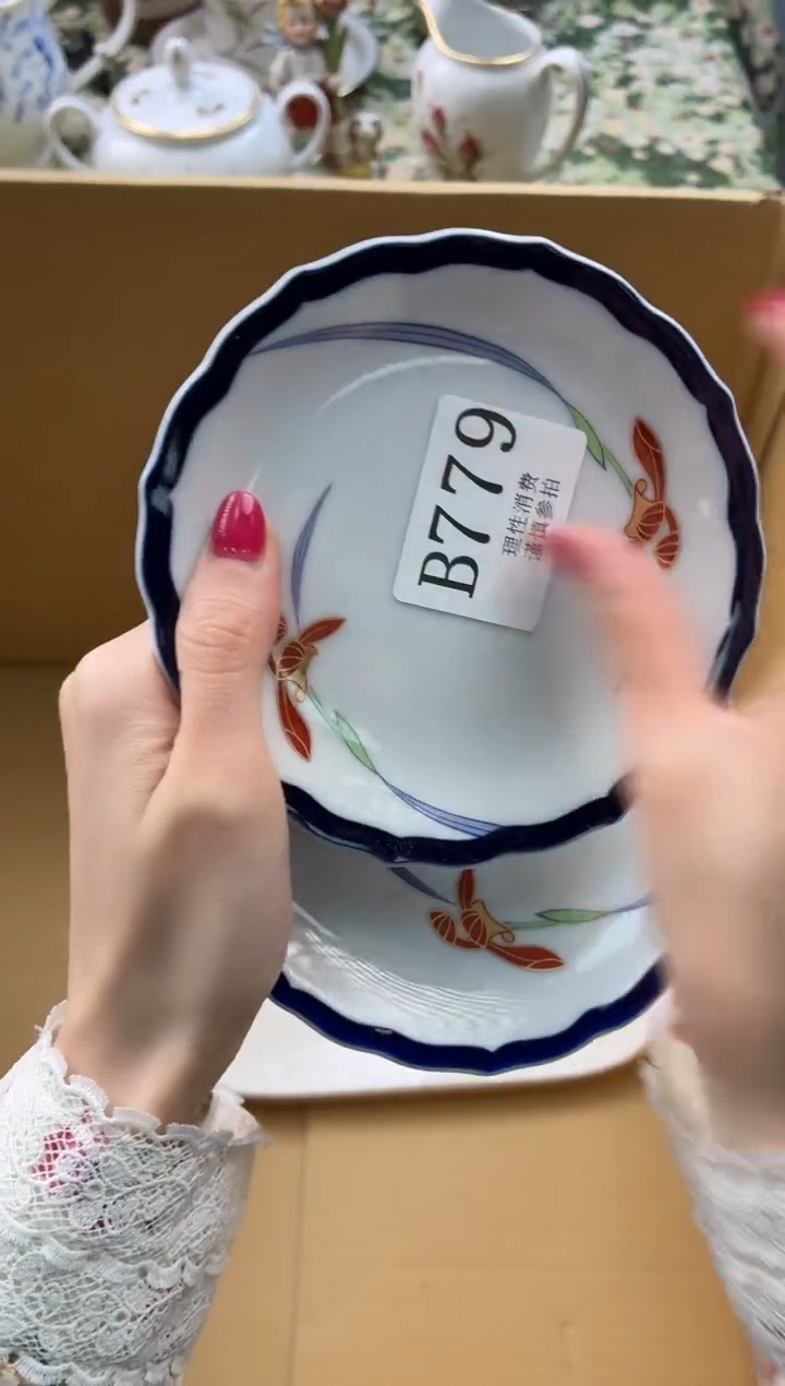 瓷片我****风       B779