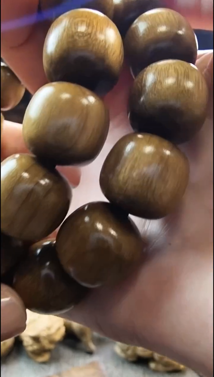 金丝       楠1.5阴沉黄桶珠