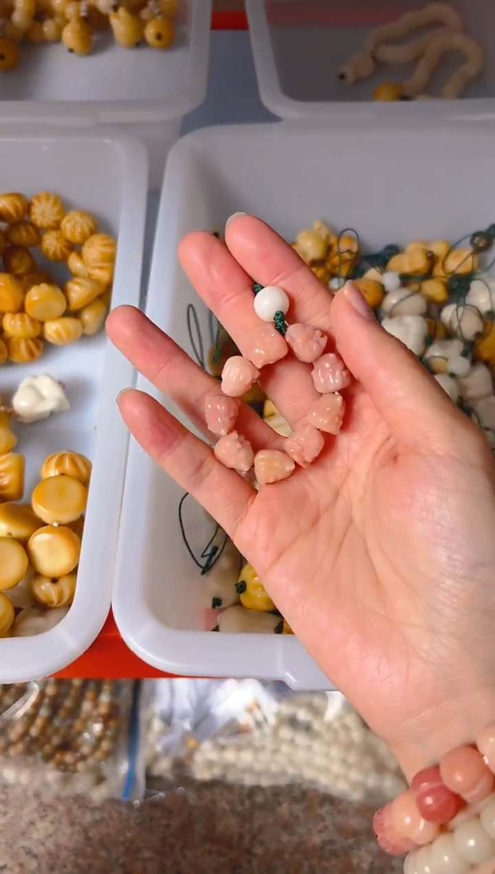 吊坠菩提根/象牙果粉色凤九手机链