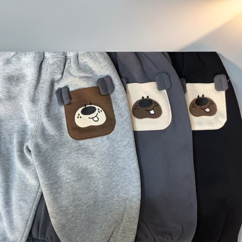 精品时尚一体加绒男童女童潮流童裤卡通花型柔软舒服百搭款童裤