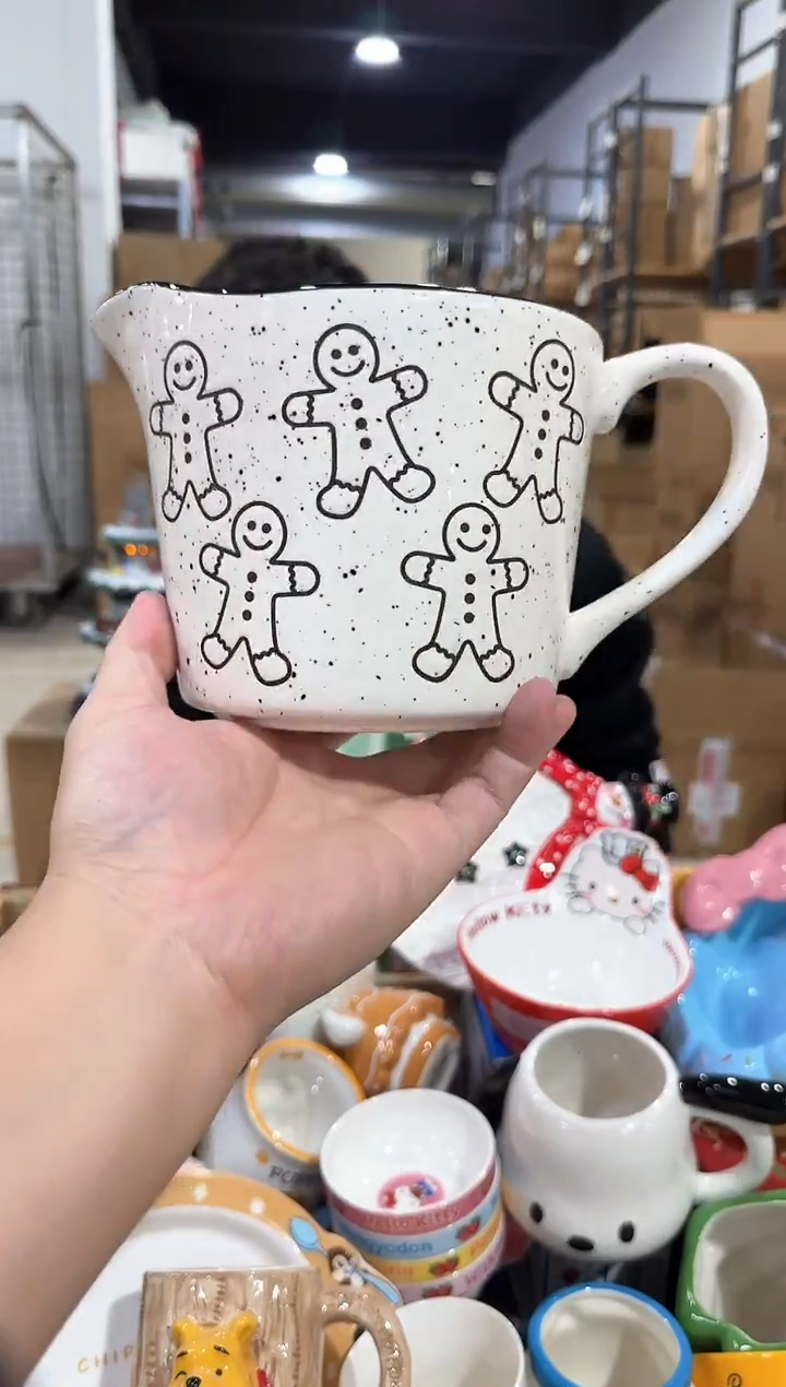 瓷片姜饼人奶壶 
