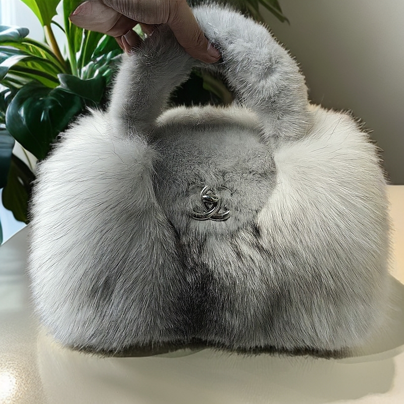 2025狐狸毛包女秋冬新款时尚包包高级蓝宝石手提单肩外出斜挎包