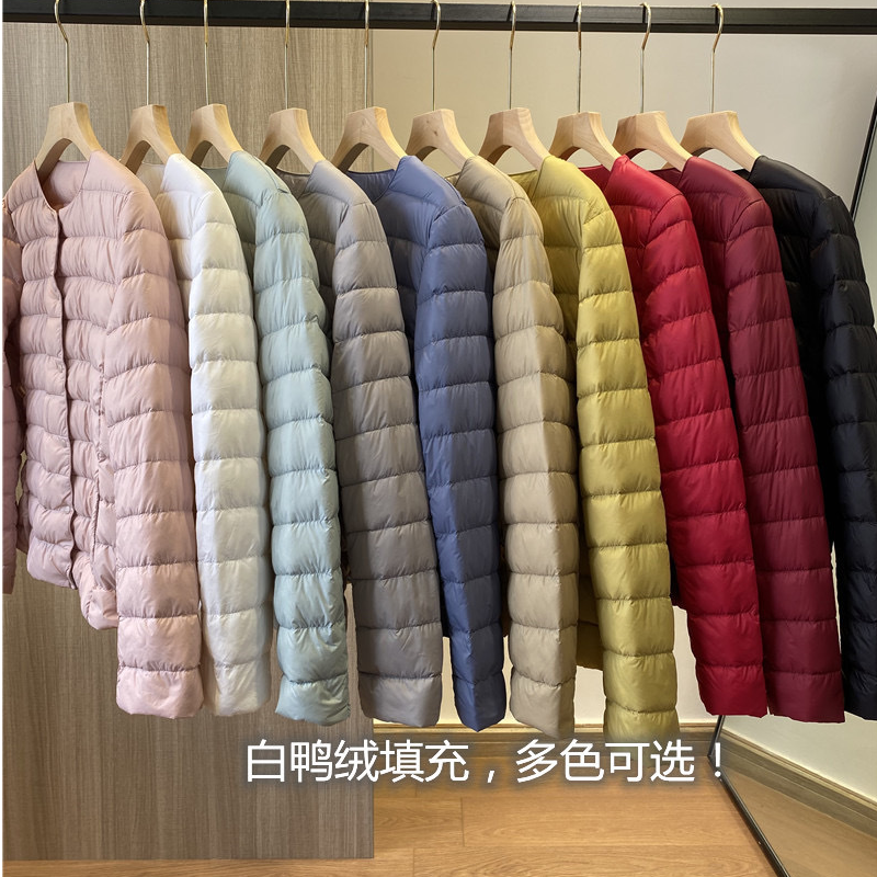崔万志秋冬款轻薄羽绒服新国标90白鸭绒时尚短款女士保暖