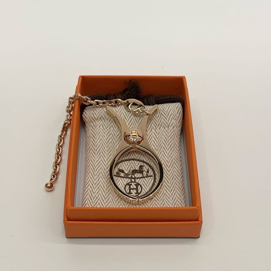全新未使用 Hermes/爱马仕 玫瑰金包挂 夹子