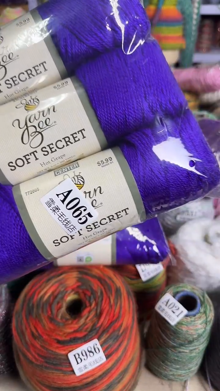 羊毛混纺六*姐2包黑，2包深紫A065