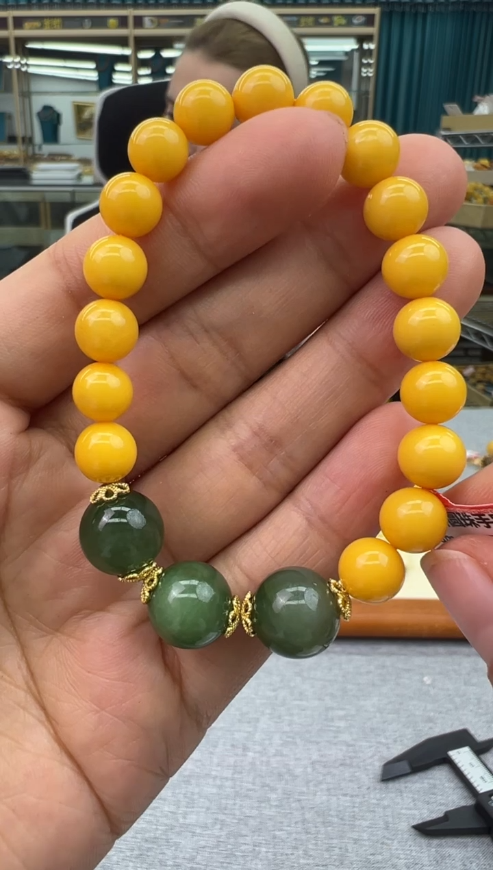 未镶嵌琥珀手链13秒拍号假一罚十