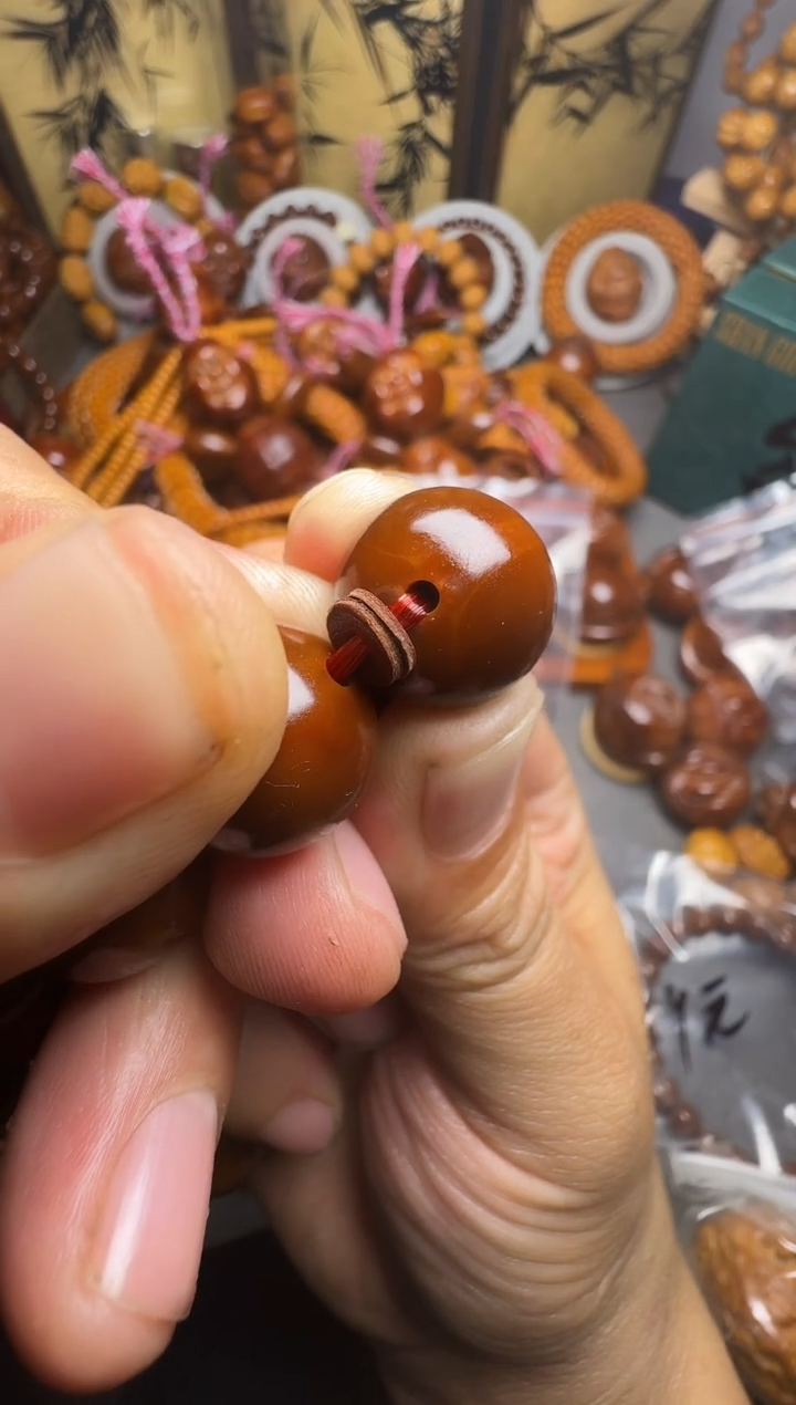 手串橄榄核地****司光珠一串