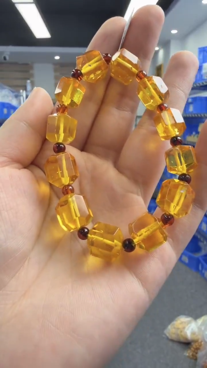 未镶嵌琥珀手链13秒拍号假一罚十