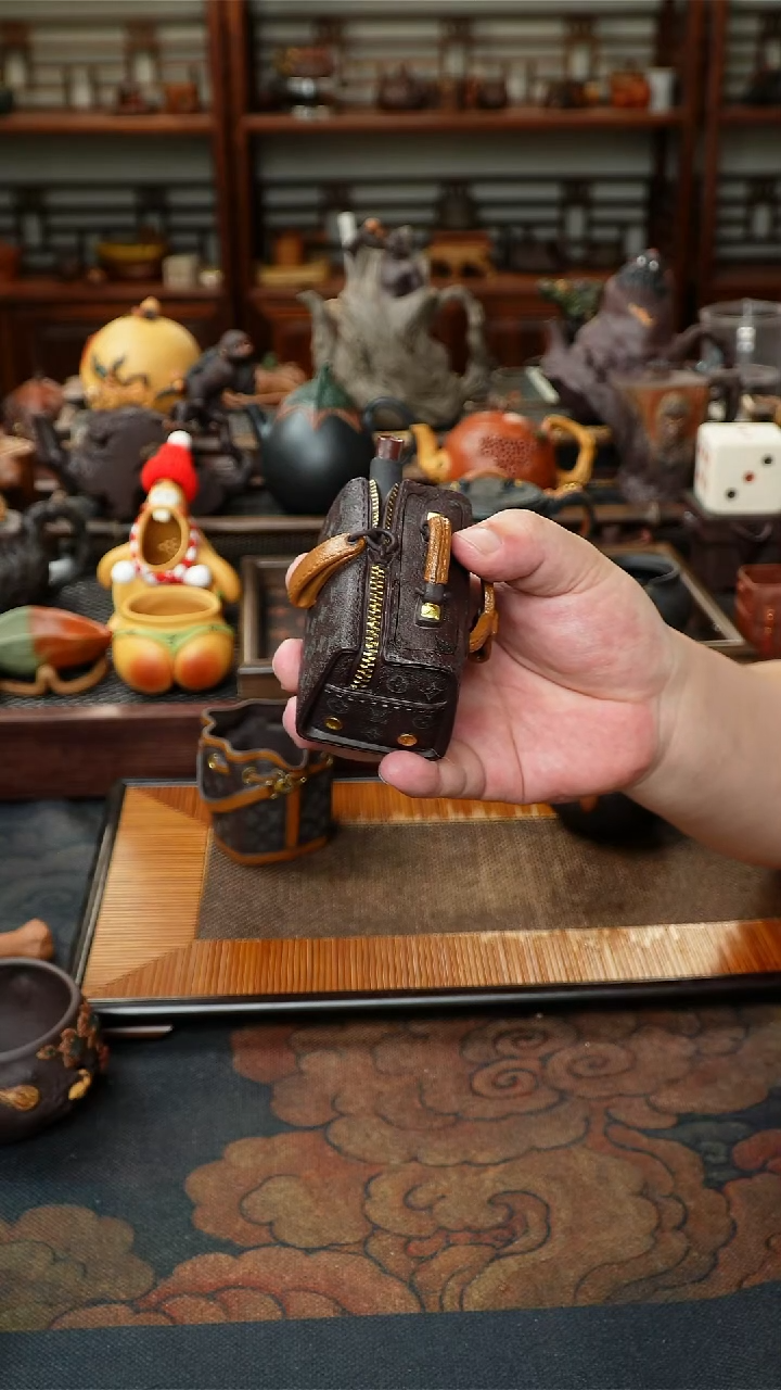 茶壶紫砂包包壶返还甲方客户