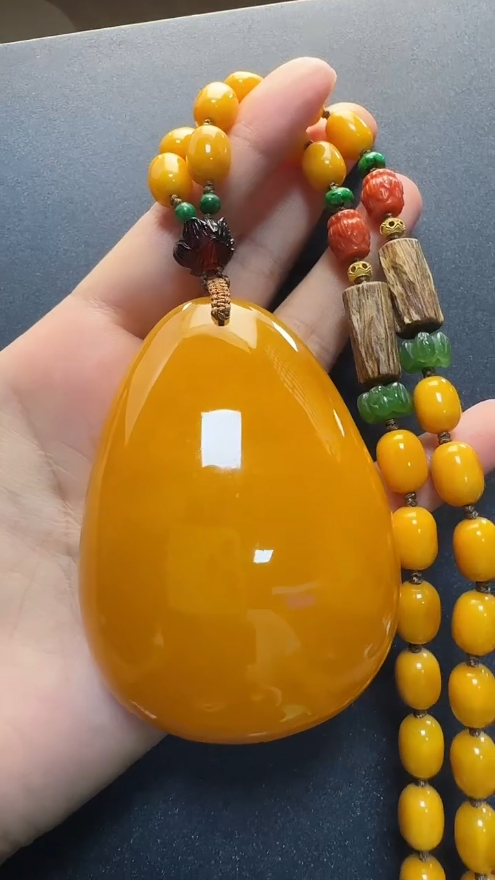 蜜蜡吊坠(赠链)18K金镶嵌天然保真蜜蜡水滴套装